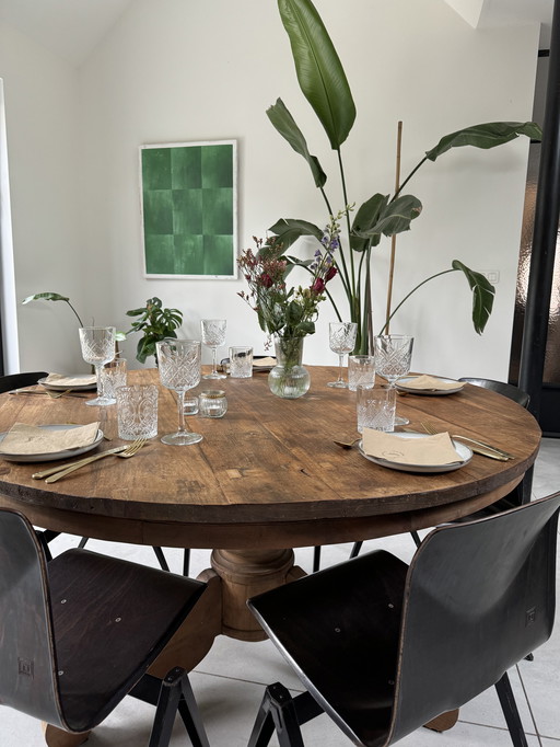 Old wooden round dining table