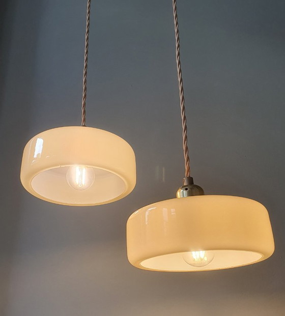 Image 1 of Vintage pendant lamp set (2) of yellow pastel opaline glass. Art Deco design.