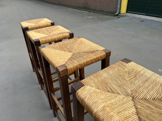 Image 1 of set van 4 houten barkrukken met rotan zitting