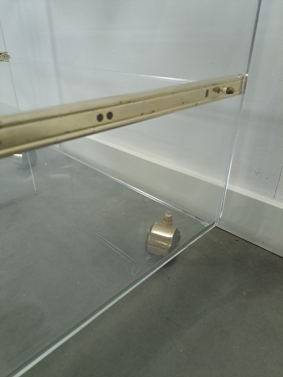 Image 1 of Space age plexiglas trolley met messing