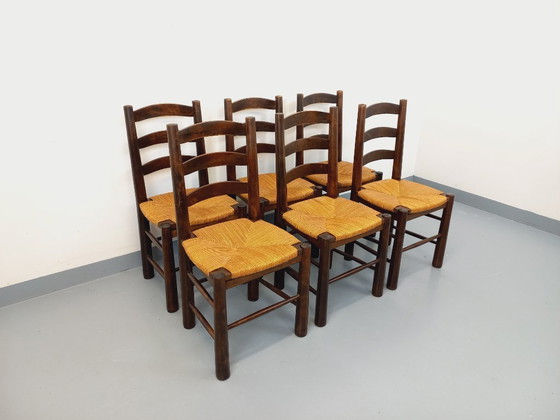 Image 1 of Set van 6 vintage brutalistische stoelen van Georges Robert, gemaakt van hout en stro, uit de jaren 50 en 60.