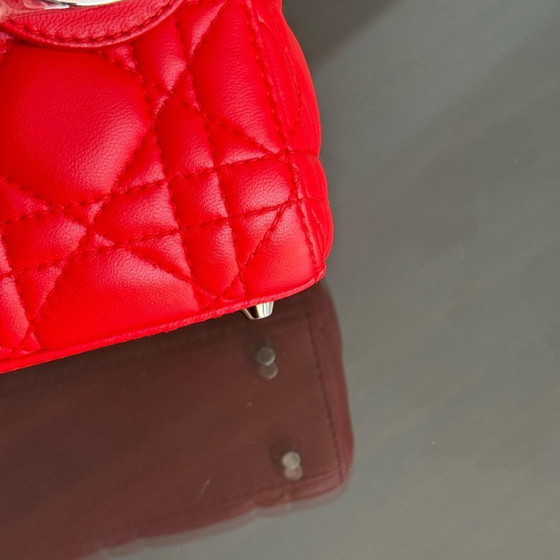 Image 1 of DIOR LADY MINI - PELLE DI AGNELLO CANNAGE ROSSO, DETTAGLI ARGENTO, CINTURINO REGOLABILE