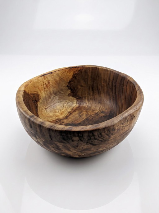 Large bowl made from a single piece of turned olive wood, 1950s-1970s