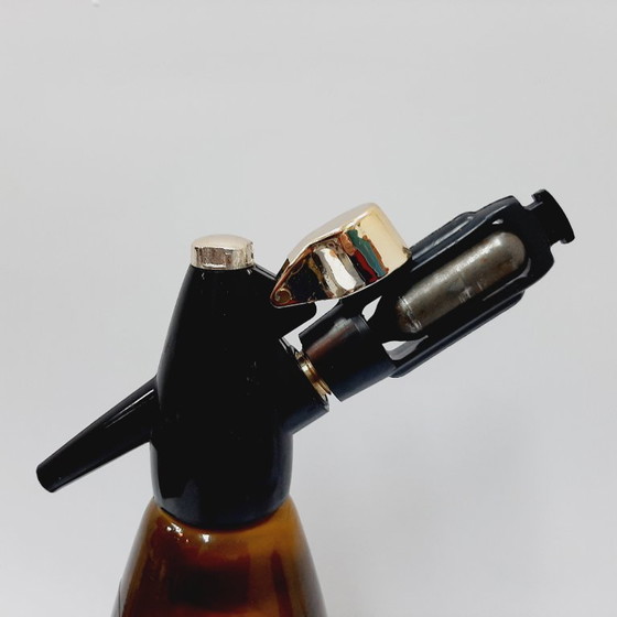 Image 1 of Vintage jaren 70 gele/bruine metalen frisdrankfles