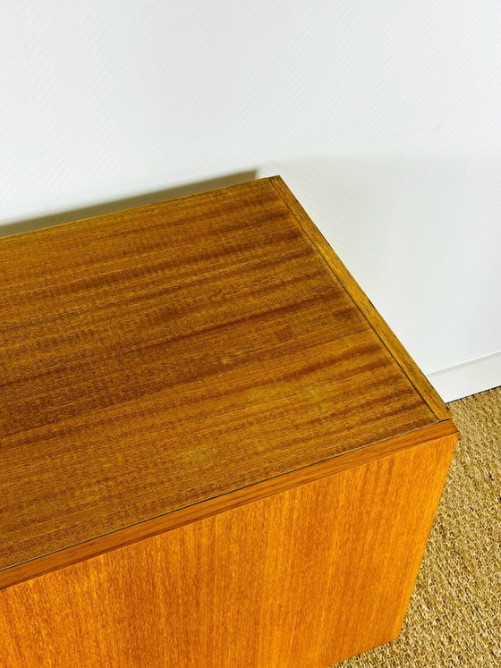 Image 1 of Minimalist Scandinavian sideboard in teak with black metal legs, 1960
