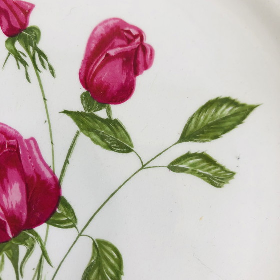 Image 1 of Steingutteller von L'Amandinoise mit einem floralen Art-Deco-Motiv