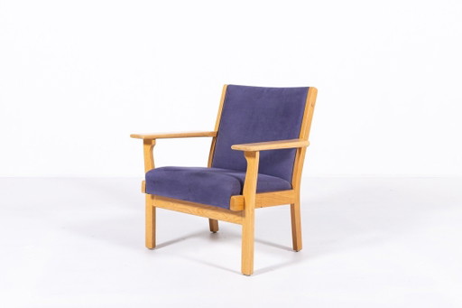 Poltrona di design scandinavo disegnata da Hans Wegner per Getama, Danimarca, anni '80.