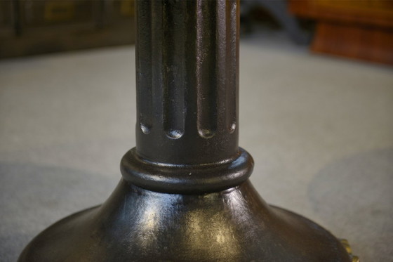 Image 1 of Neo-classical cast iron and verre églomisé coffee table, 1940s