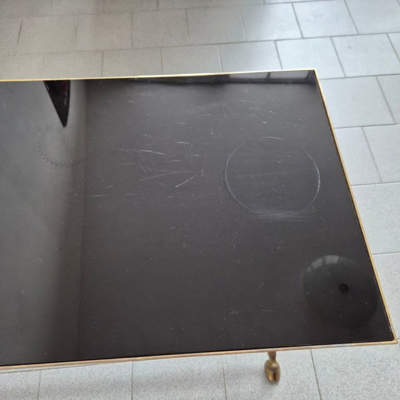 Image 1 of Vintage 1970s Maison Jansen coffee table in bronze and glass with goat's feet, 70s chic