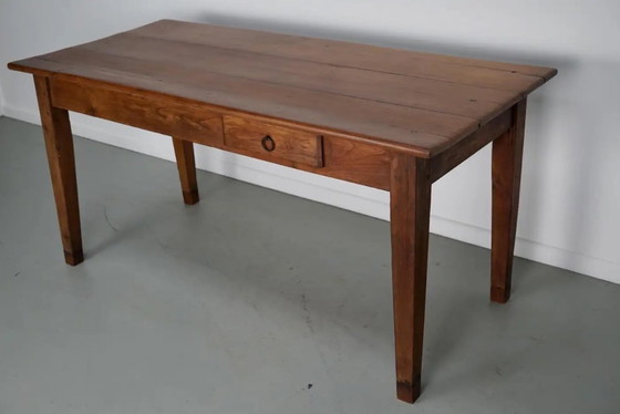 Image 1 of Early 20th-century French rustic country dining table made of fruitwood