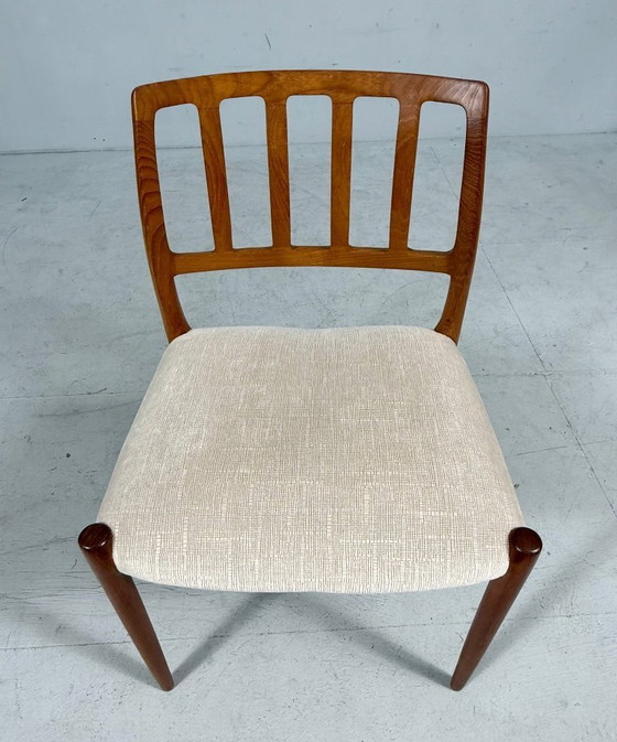 Image 1 of JL Møllers, ensemble de 4 chaises de salle à manger, modèle '83', teck, laine, années 1960, Danemark (4)