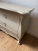 Classic Taupe Dresser With Ornate Shapes
