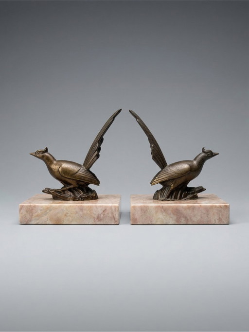 Pair of Art Deco bookends with birds – patinated spelter and pink marble – vintage – 1930s