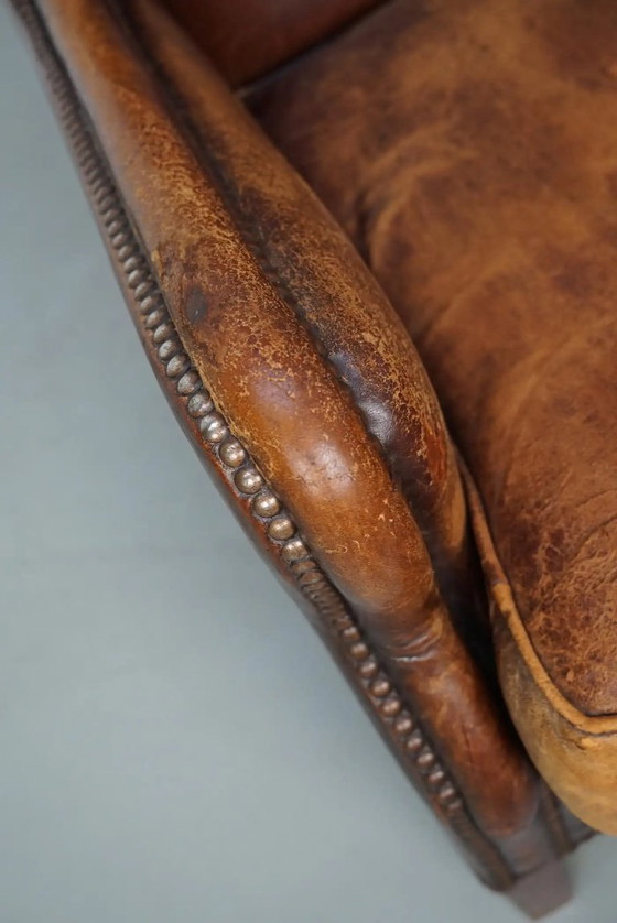 Image 1 of Vintage Nederlandse clubfauteuil van cognackleurig leer