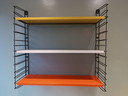 Vintage Tomado wall rack