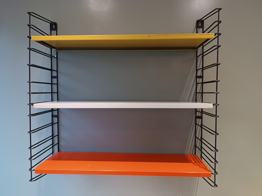 Vintage Tomado wall rack
