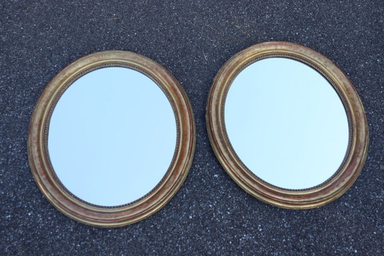 Image 1 of Pair of oval Louis Philippe period mirrors in giltwood