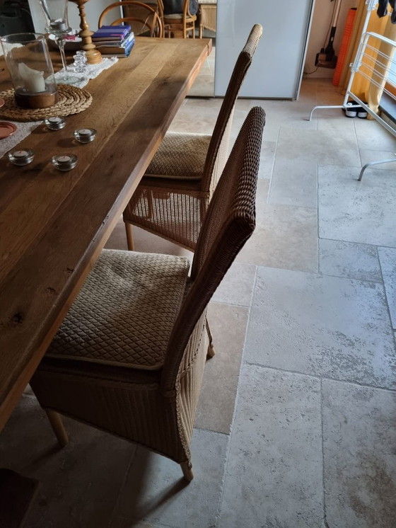 Image 1 of monastery table + 6 wicker chairs