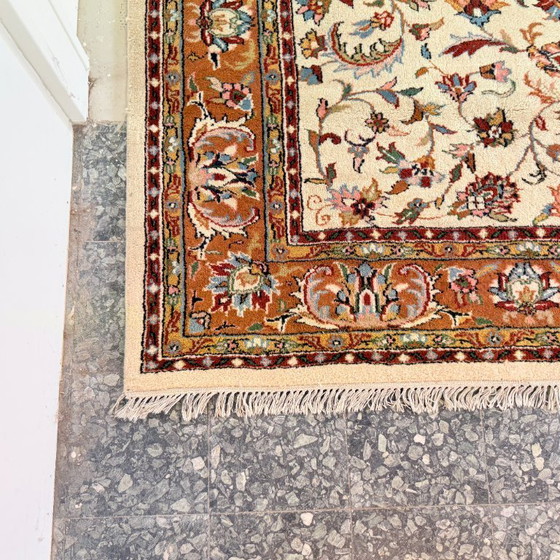 Image 1 of Large vintage rug with floral pattern