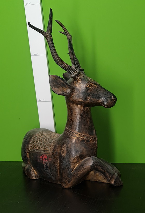 Image 1 of Hölzerne liegende Hirsche