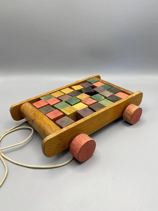 Vintage houten trekkar – Bouwspeelgoed – Kleurrijke houten blokken – jaren 1950-1960 – decoratieve objecten, Cotton