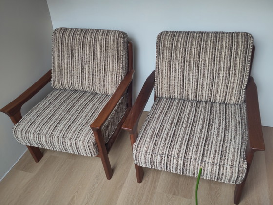 Image 1 of Set van 2 vintage fauteuils – massief teak & originele bekleding (jaren ’70)