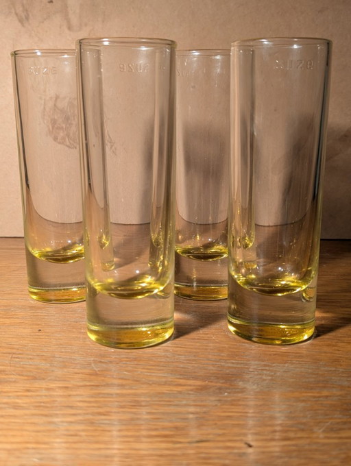 Set di 4 bicchieri a tubo SUZE, gialli, di Jean Nouvel