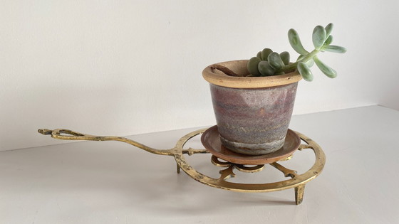 Image 1 of Solid brass trivet