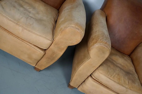 Image 1 of Coppia di poltrone da club francesi in pelle color cognac con schienali a baffo, anni '40