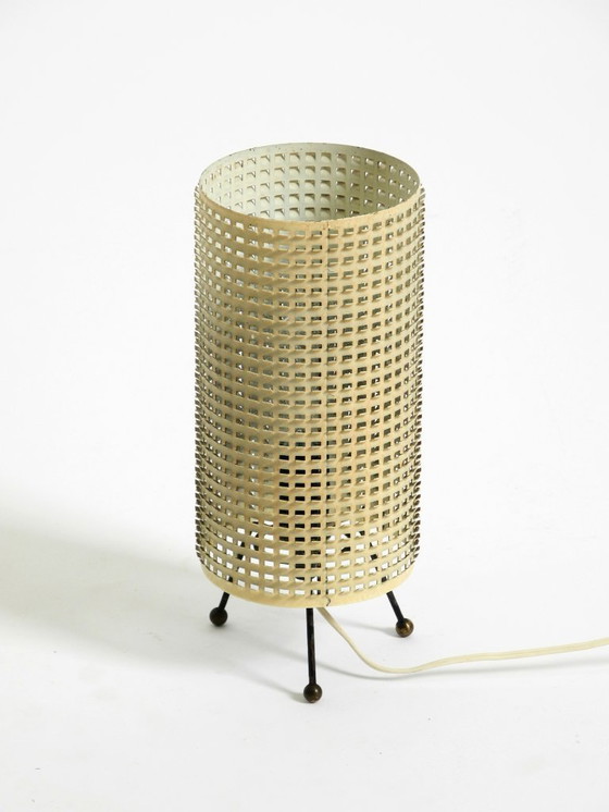 Image 1 of Original 1950s brass tripod table lamp with a perforated metal lampshade