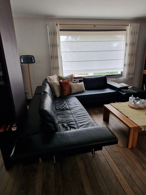 Salon d'angle en cuir avec pouf marque Müsterring