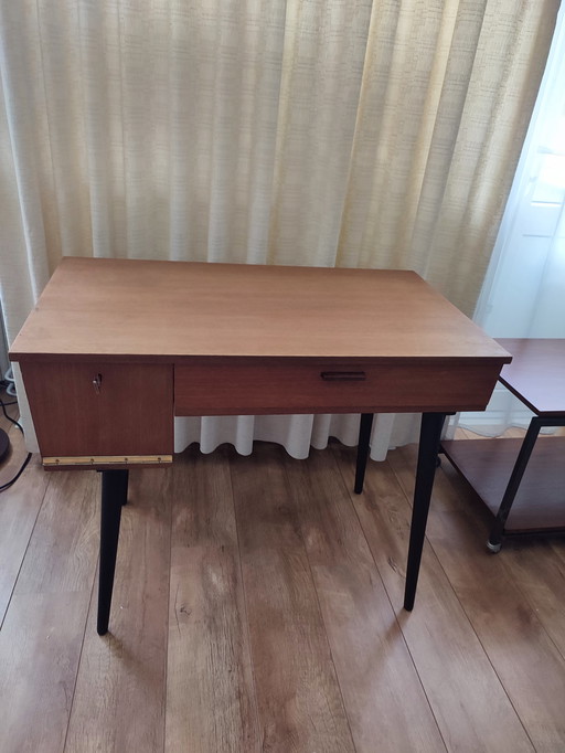 Vintage wooden desk on black legs with drawer