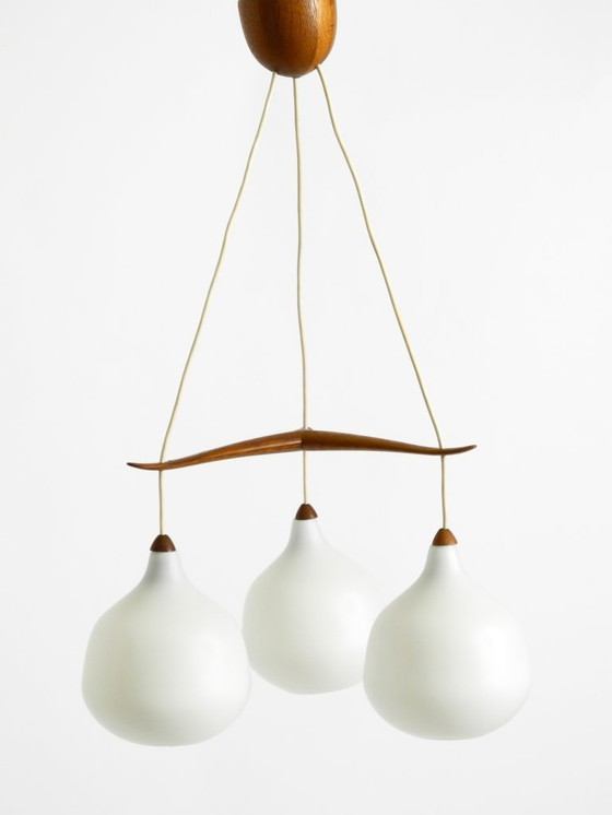 Image 1 of Beautiful pendant lamp with three opal glass shades and a teak frame by Uno & Östen Kristiansson for Luxus Vittsjö, Sweden 1957