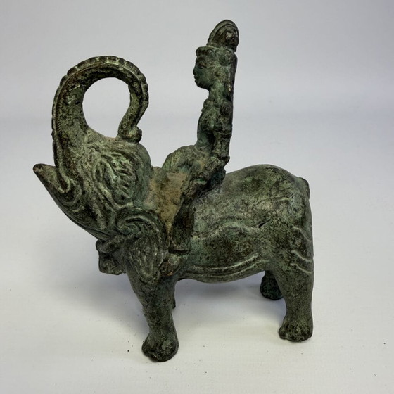 Antique bronze sculpture of man on elephant (photo 6 of 12)