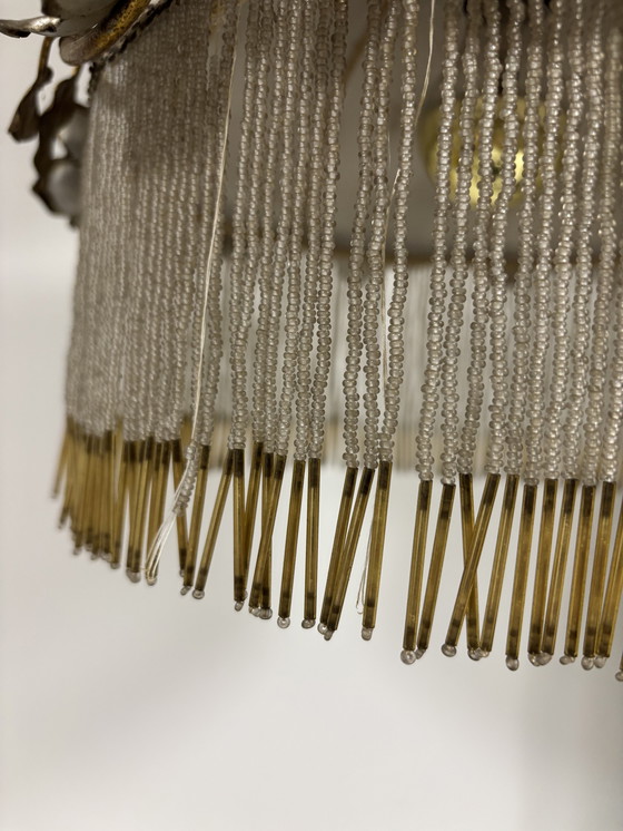 Image 1 of Exclusive chandelier with brass leaves and silver-colored roses