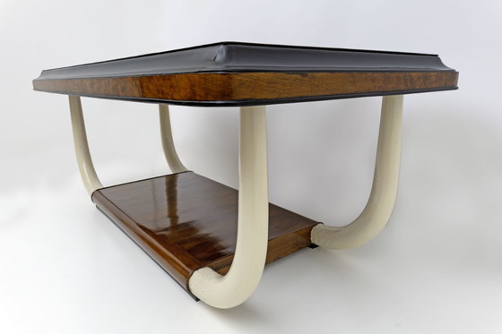 Image 1 of Art Deco Italiaanse notenhouten glazen tafel met olifant slagtandpoten, jaren '30