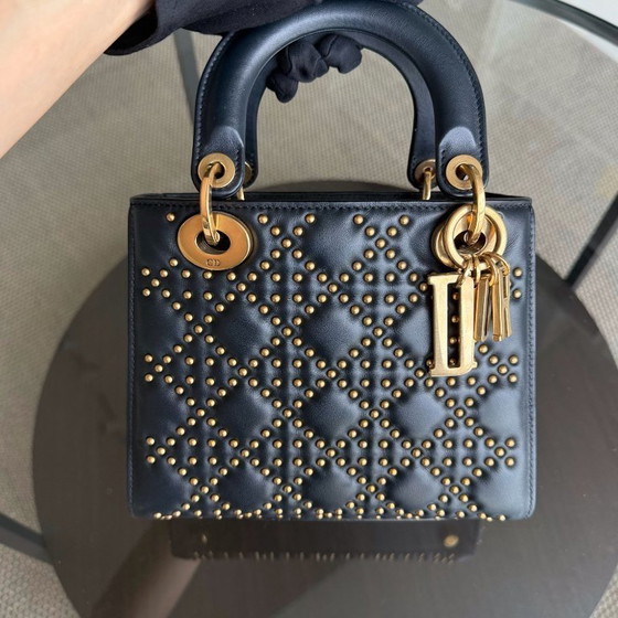 Image 1 of DIOR LADY SMALL FLAP - PELLE DI VITELLO CANNAGE CON BORCHIE NERE E MATERIALI ORO