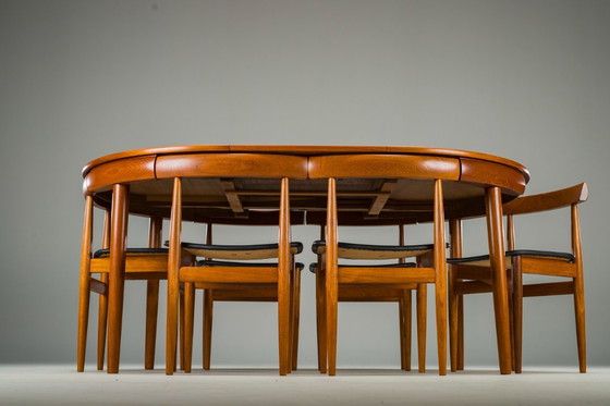 Image 1 of Mesa de comedor extensible y sillas danesas de teca de Hans Olsen para Frem Røjle, años 60, juego de 7