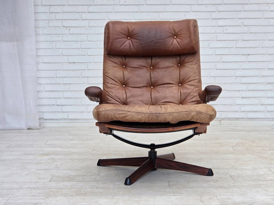 Image 1 of Anni '60, poltrona girevole scandinava, rivestimento in pelle marrone.