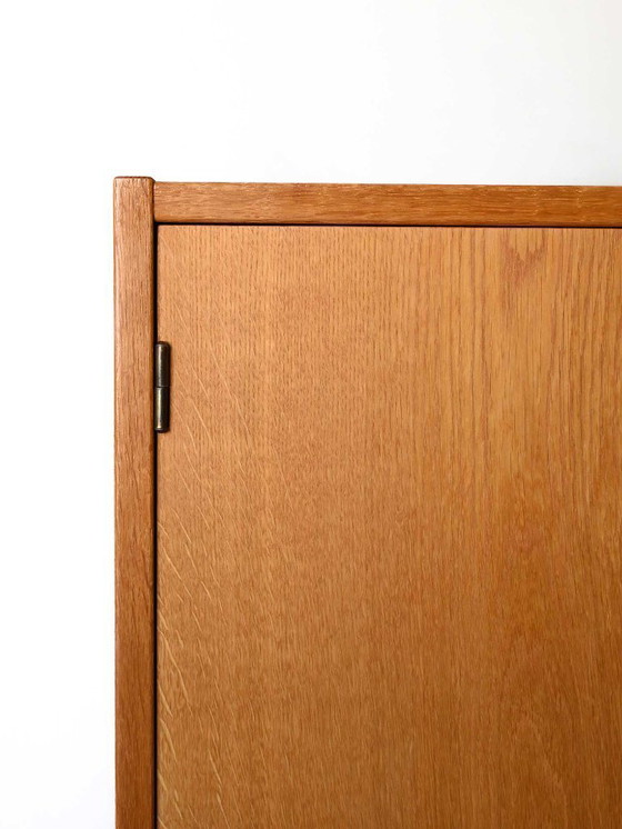 Image 1 of Vintage Scandinavisch eikenhouten dressoir met lades met tegelfront