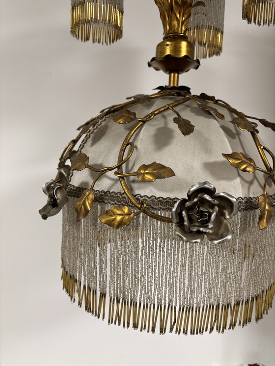 Image 1 of Exclusive chandelier with brass leaves and silver-colored roses