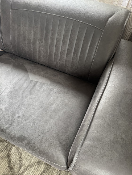 Image 1 of 3 sits bank Sowerby