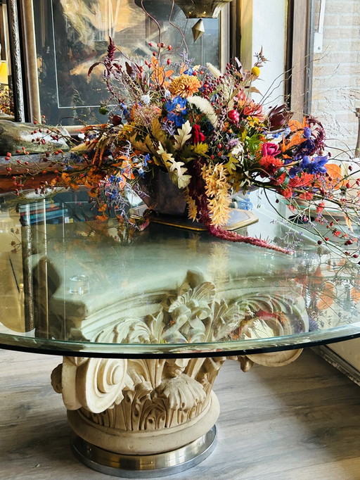 Beautiful round table with ornamental foot