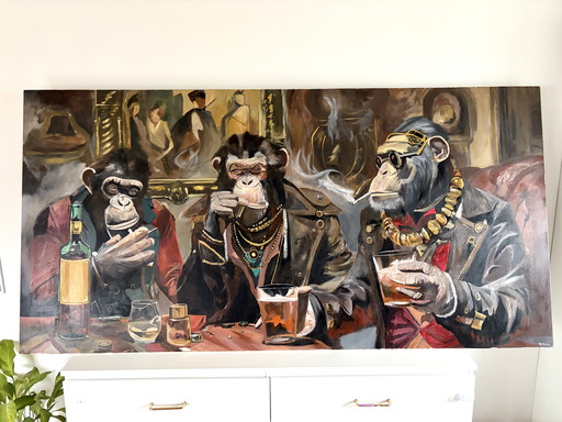 Tres monos en el bar