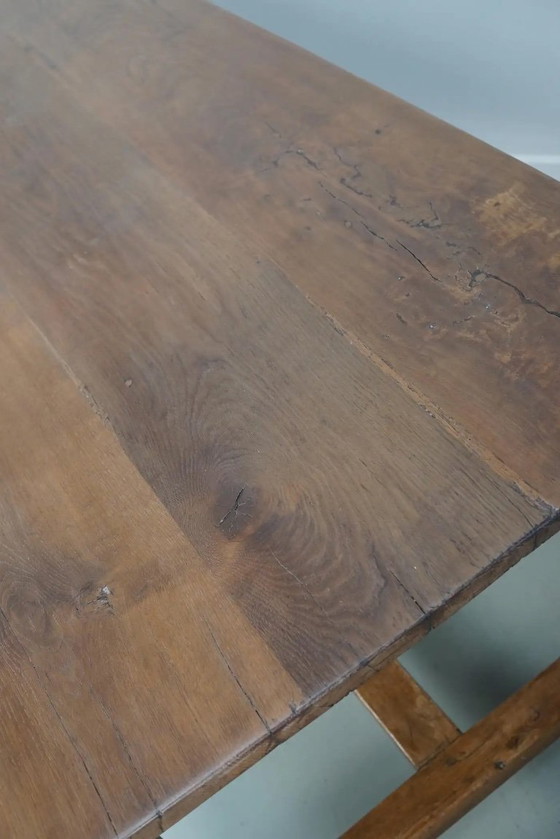 Image 1 of Early 20th-century French rustic country dining table made of oak and elm