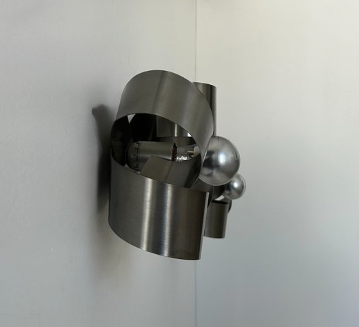 Pair of curved metal sconces, France 1960