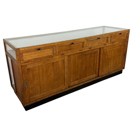 Image 1 of Grote vintage eikenhouten winkelvitrine
