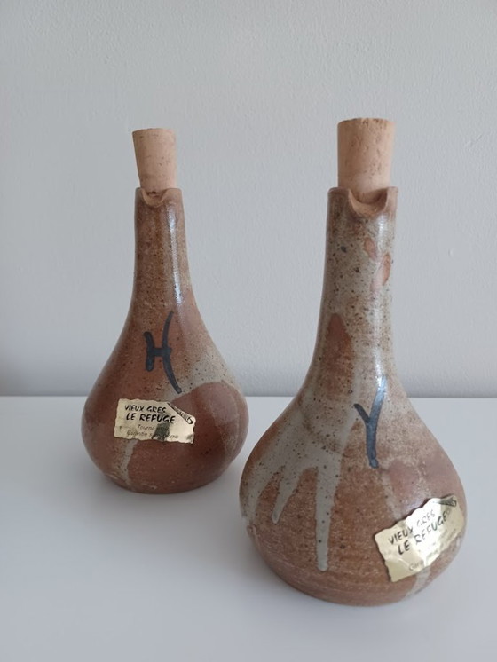 Image 1 of Set di due vasi da olio e aceto vintage, fatti a mano. In ceramica. Metà secolo.
