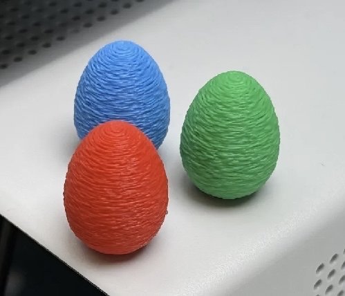 Image 1 of Coniglietto pasquale moderno con 3 piccole uova colorate. Offerta di 7 € se interessati.