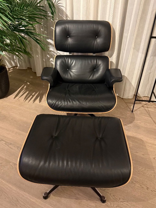 Vitra Eames Lounge Chair con otomana